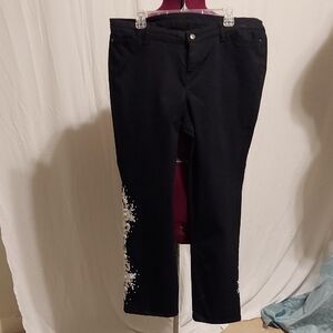 Black stretch denim jeans with custom lace and SWAROVSKI crystals.Size 38" waist